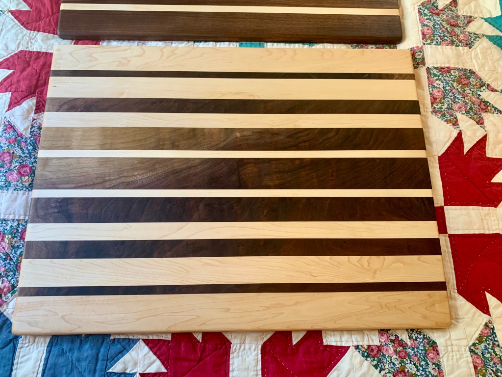 Paul D Goodman, Large moiré style cutting board, walnut and maple wood, Oct 2021